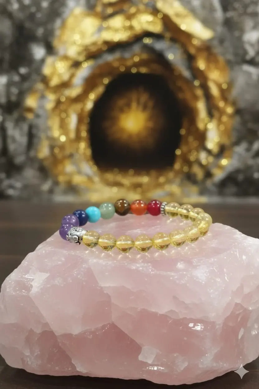 Colorful beaded bracelet on a pink crystal with a gold and black background